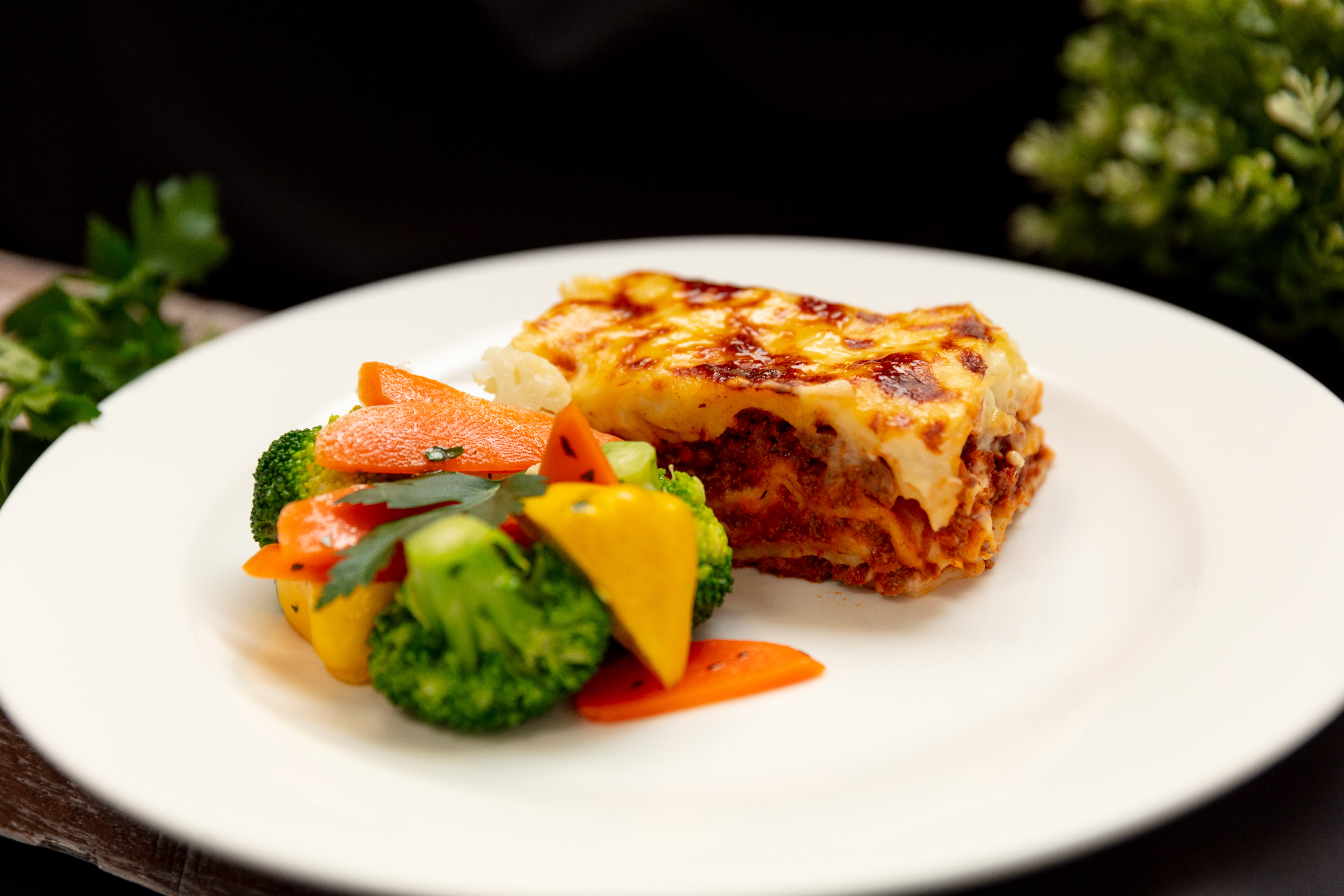 Beef lasagne with bechamel sauce and mozzarella cheese