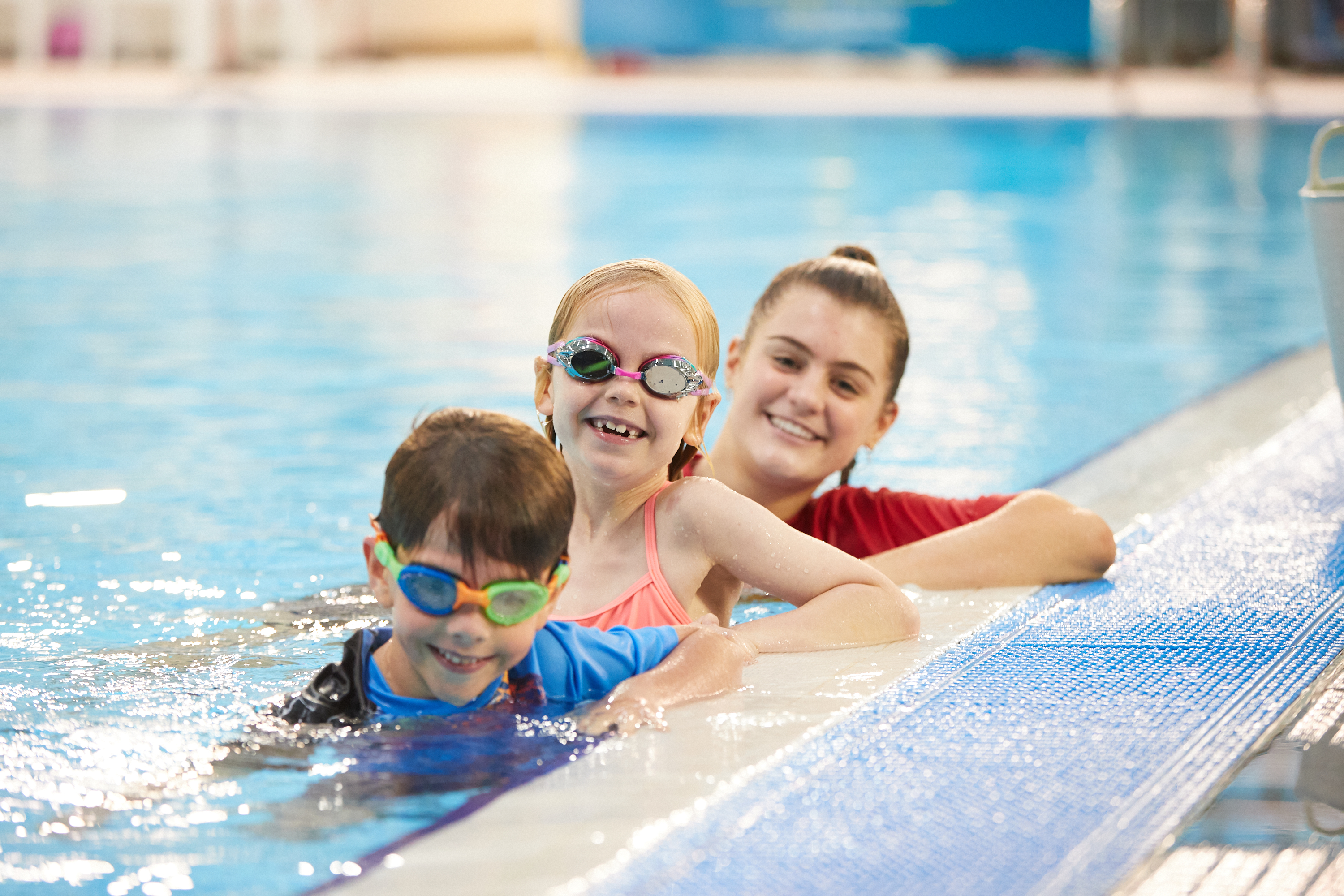 HBF Stadium swim instructor with happy students
